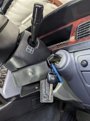 Toyota Century original OEM key wallet magnet in action